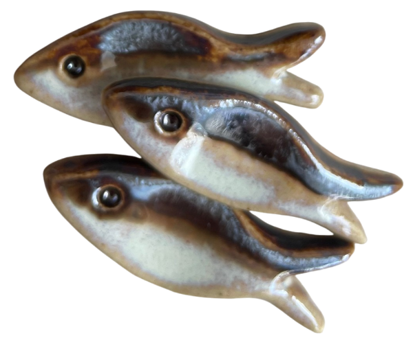 small fish in ceramics with white and brown glaze