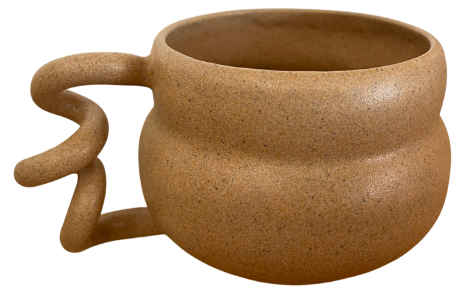 Handmade ceramic mug with a spiral handle and terracotta glaze