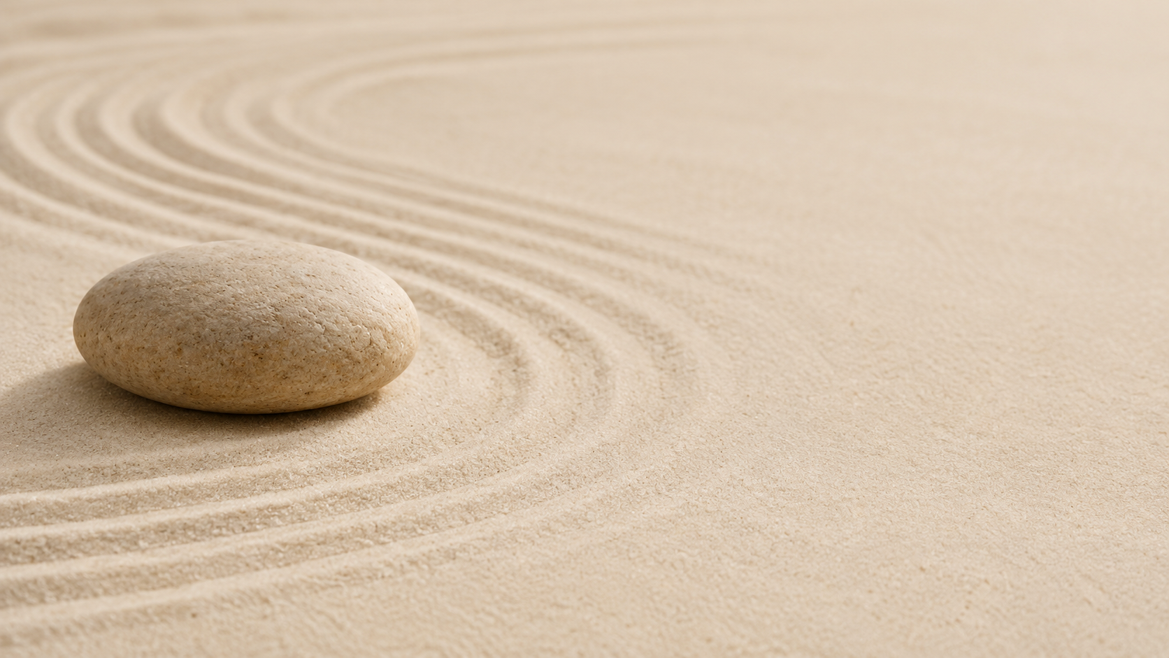 zen sand with a stone