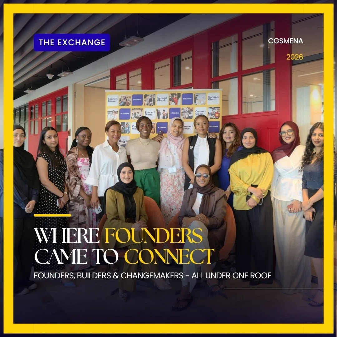 A diverse group of women standing together indoors in front of a backdrop with the event logo. The event appears to be a conference or gathering called 'The Exchange' by CGSMENA in 2026, focusing on founders, builders, and changemakers.