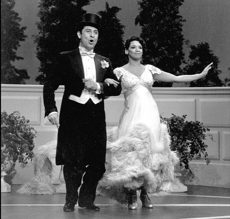 Behind the scenes of the 1984 Sesame Street musical sketch “You Say Hola and I Say Hola,” (written by Sonia Manzano), featuring Emilio Delgado as Luis alongside Manzano as Maria. Photo credit: Bob Jeronimo