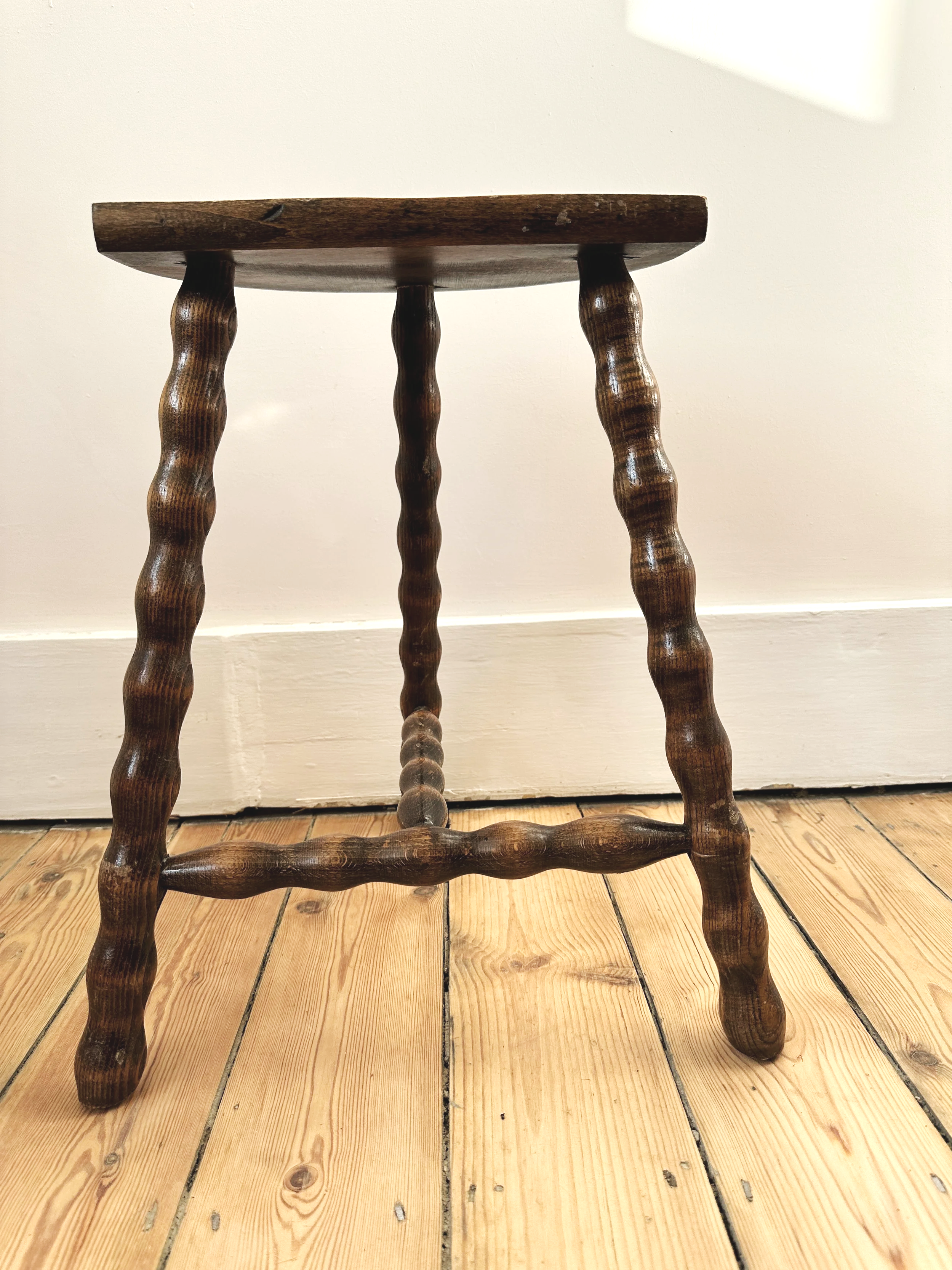 vintage-french-half-moon-stool-bobbin-legs.png