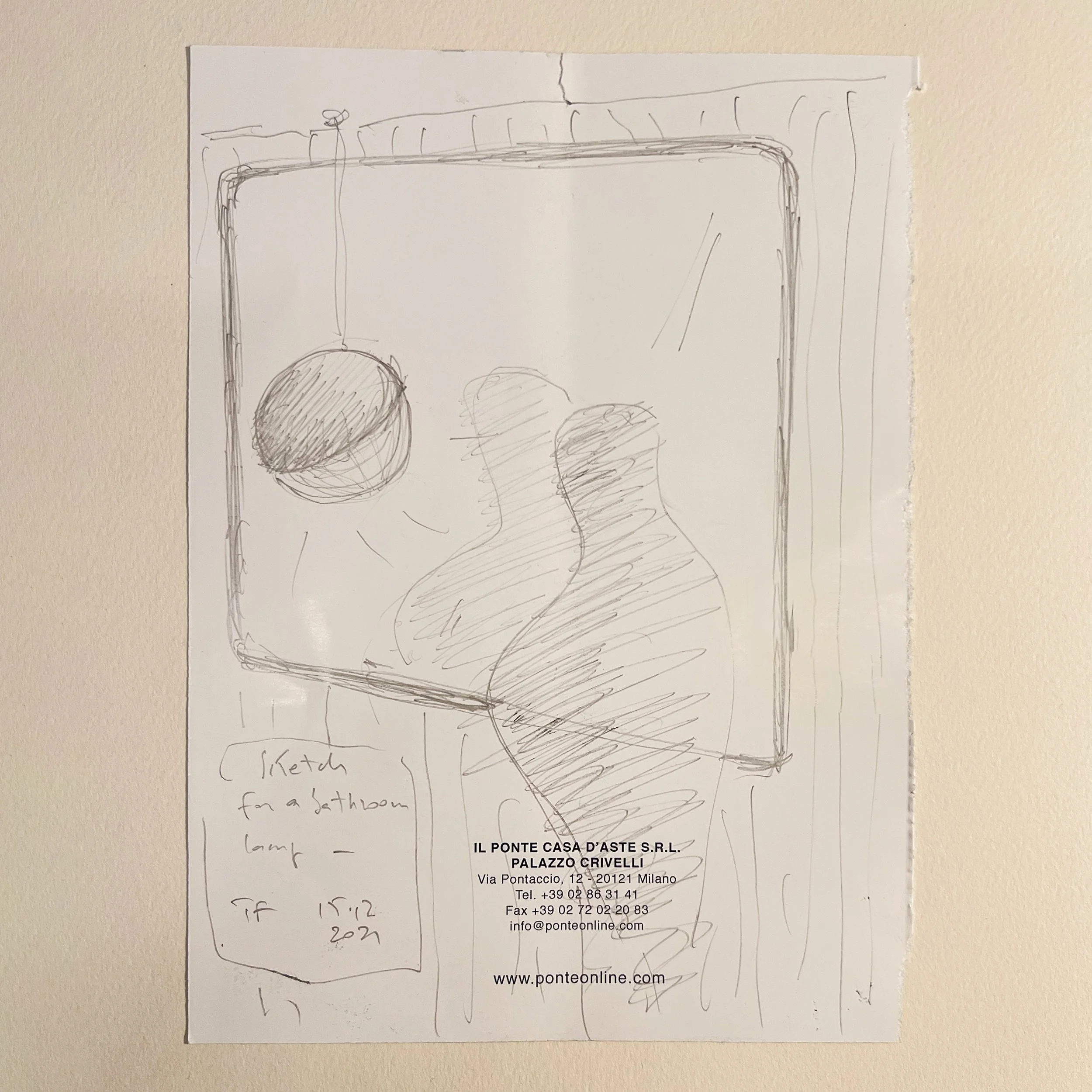 A hand-drawn sketch of a lamp of a spherical lamp for mirrors. Drawn on the paper note of IL PONTE CASA D'ASTE S.R.L. Palazzo Crivelli, Milan.