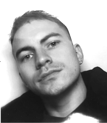 Black and white close-up portrait of a man with short hair, a slight beard, and wearing an earring, resting his head on his hand.