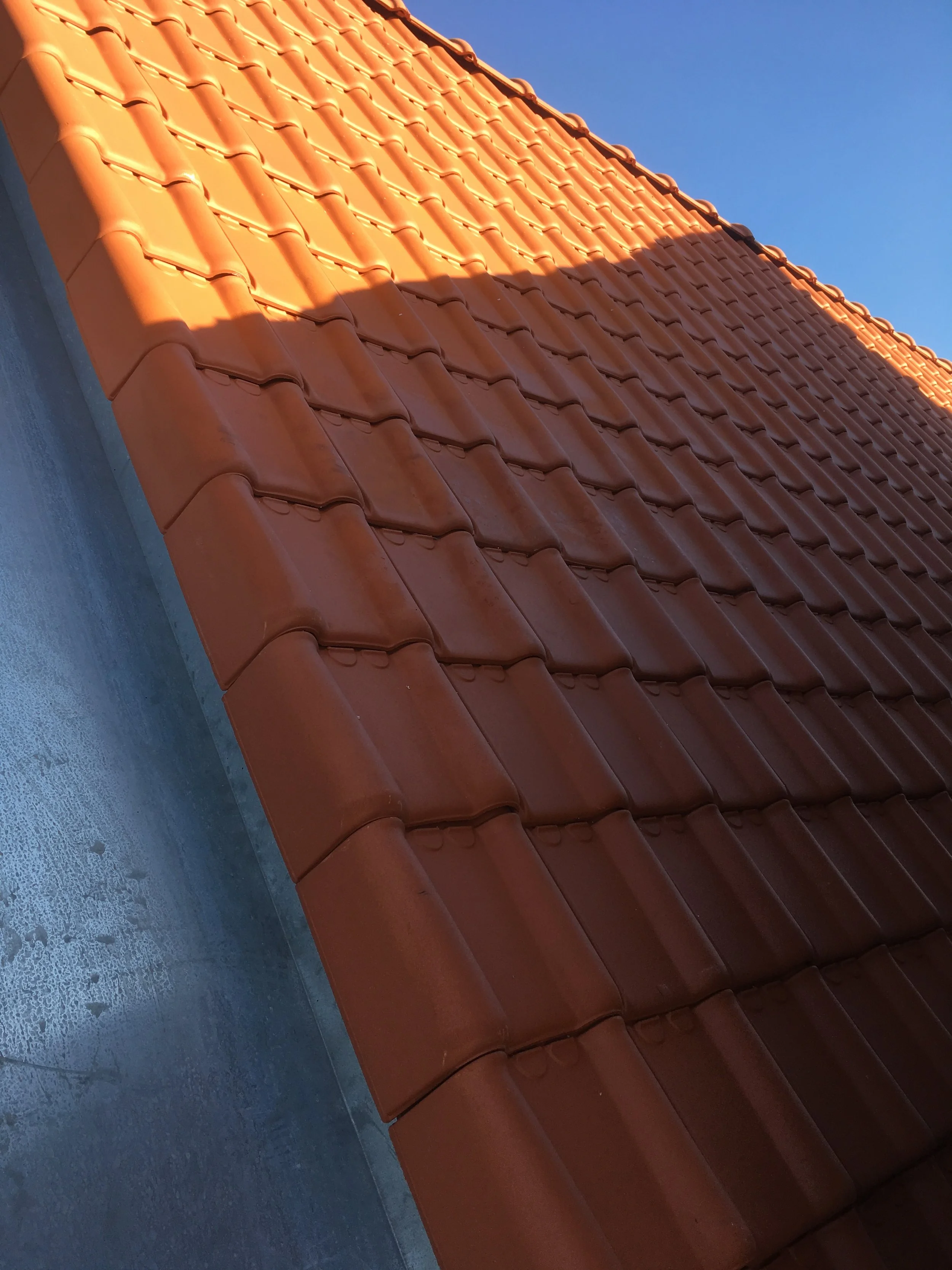 Très belle rénovation d’une maison XIXe avec toiture perpendiculaire