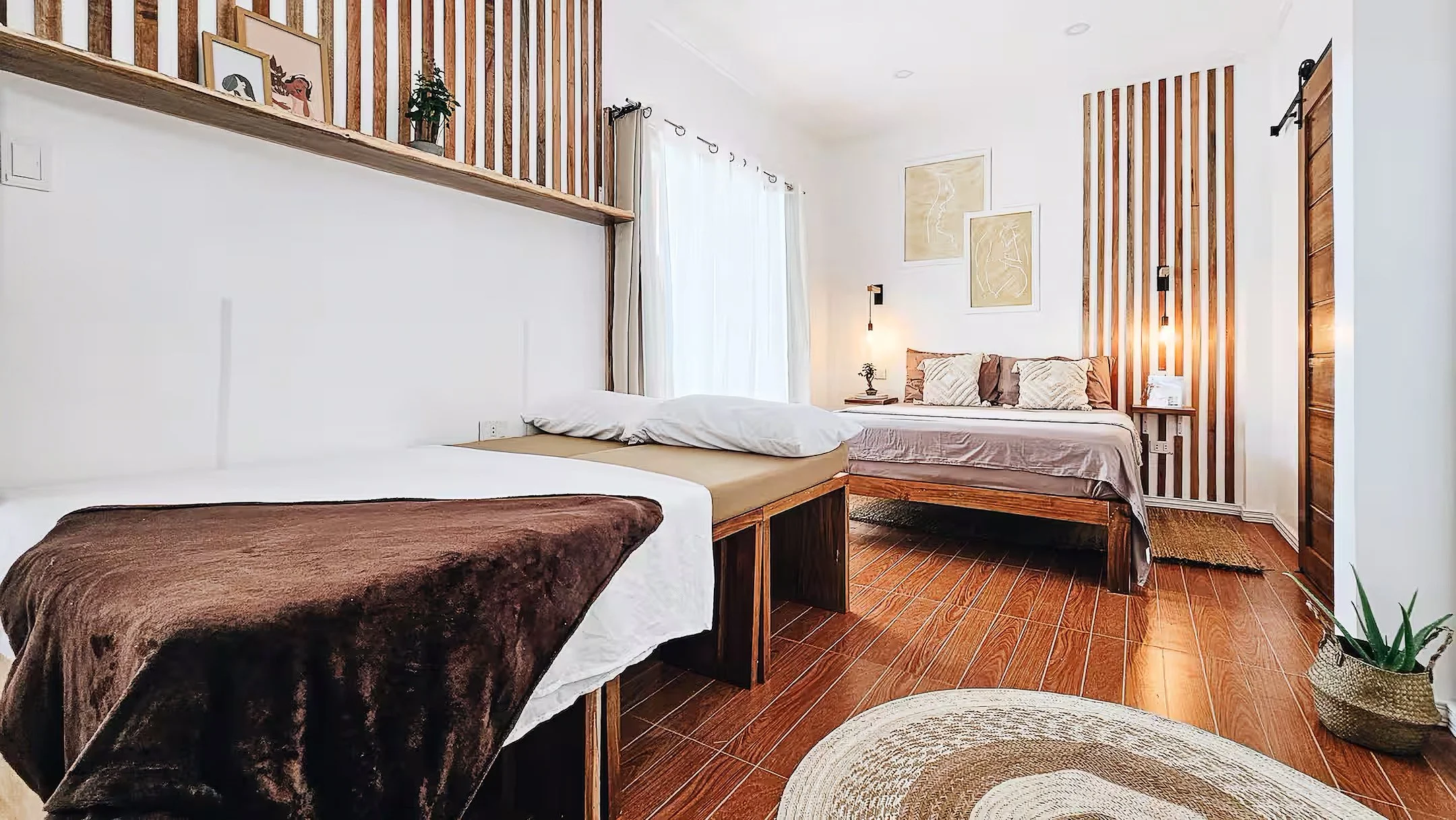 Spacious and thoughtfully arranged, Room 1 combines a queen bed and a single pullout for added flexibility. Perfect for couples, friends, or small families looking for comfort near Siargao’s best spots.