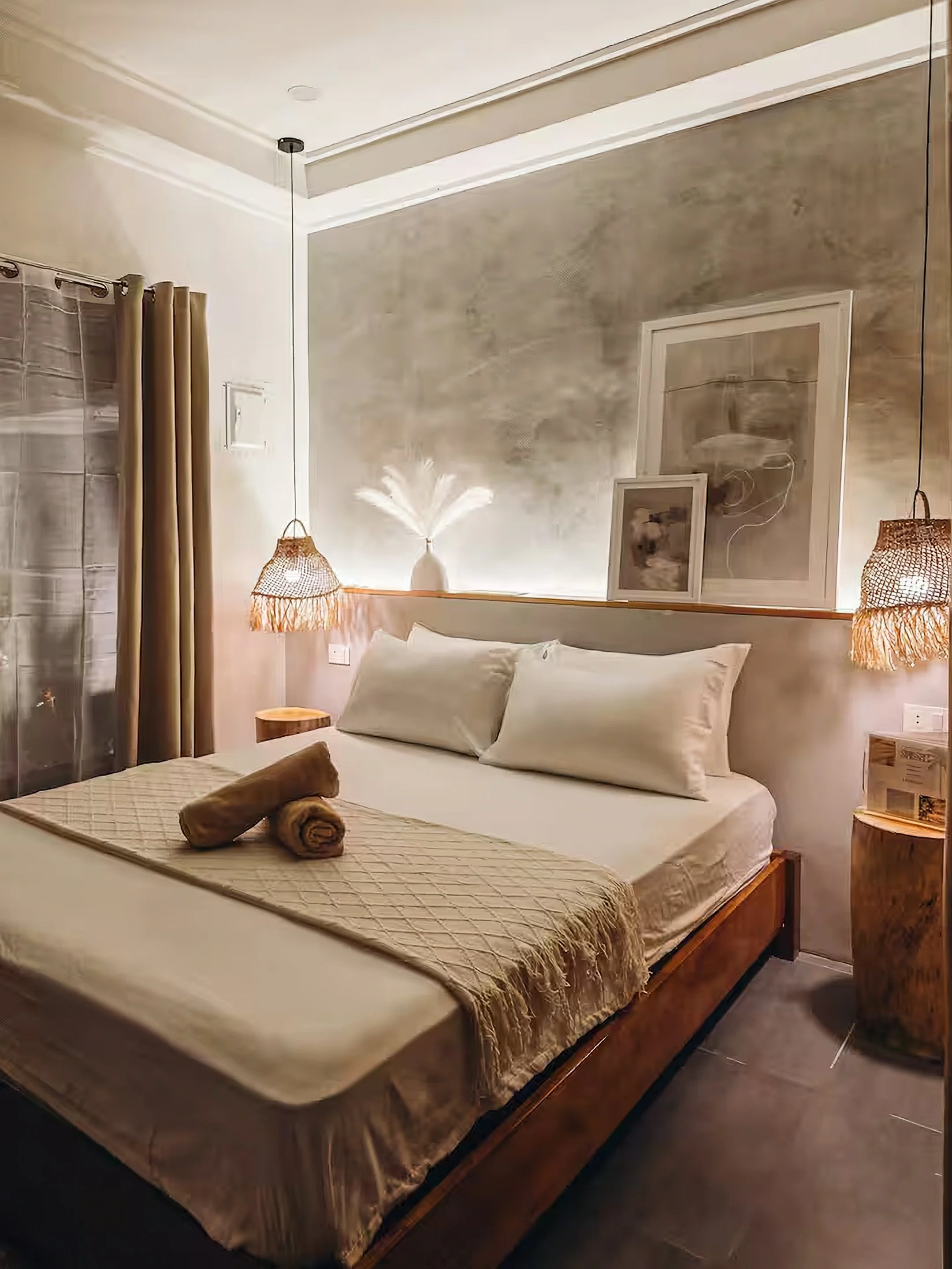 White Palm Villas Siargao Room 2 bedroom with warm lighting, minimalist tropical design, and a double bed in a private villa