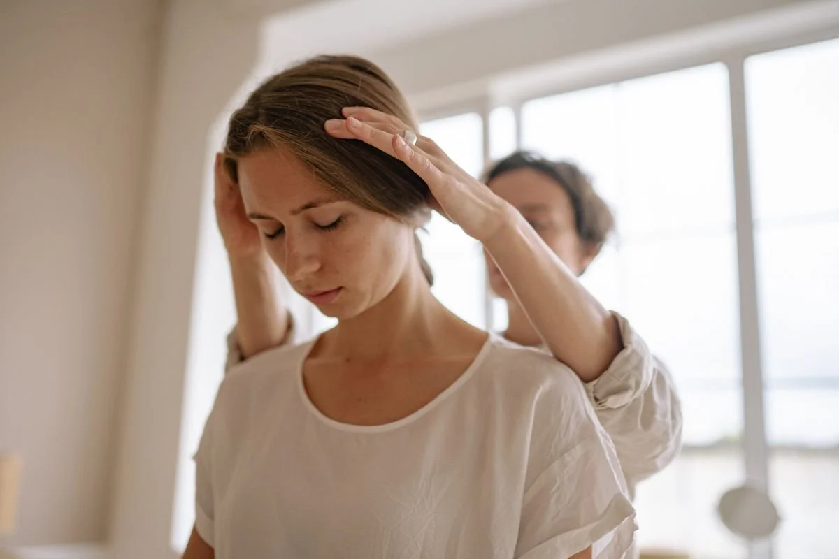 Woman's reflexes getting assessed for an avm by an avm specialist