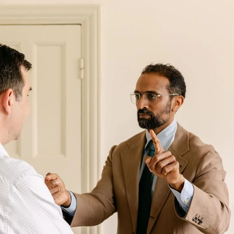 Neurosurgeon performing assessment.