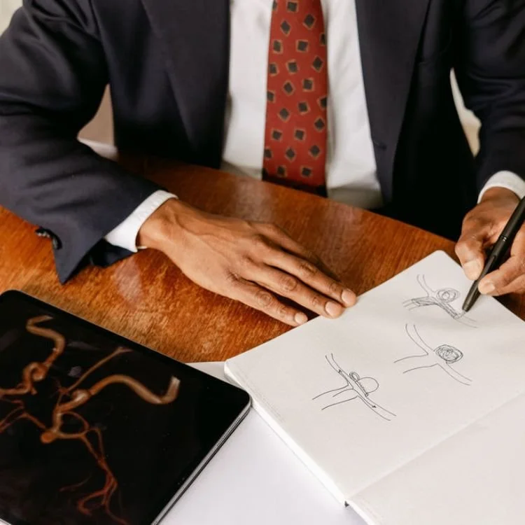 Mr Ahilan Kailaya-Vasan, neurovascular surgeon.