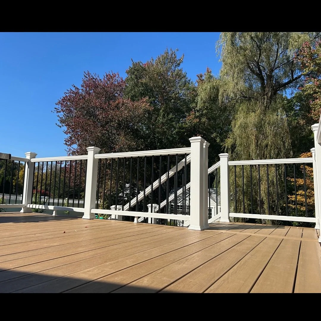 A transformation in both form and function. We replaced the original decking with custom-installed, low-maintenance composite for enduring elegance. The stairwell was thoughtfully relocated to enhance flow and maximize usable space&mdash;crafted with
