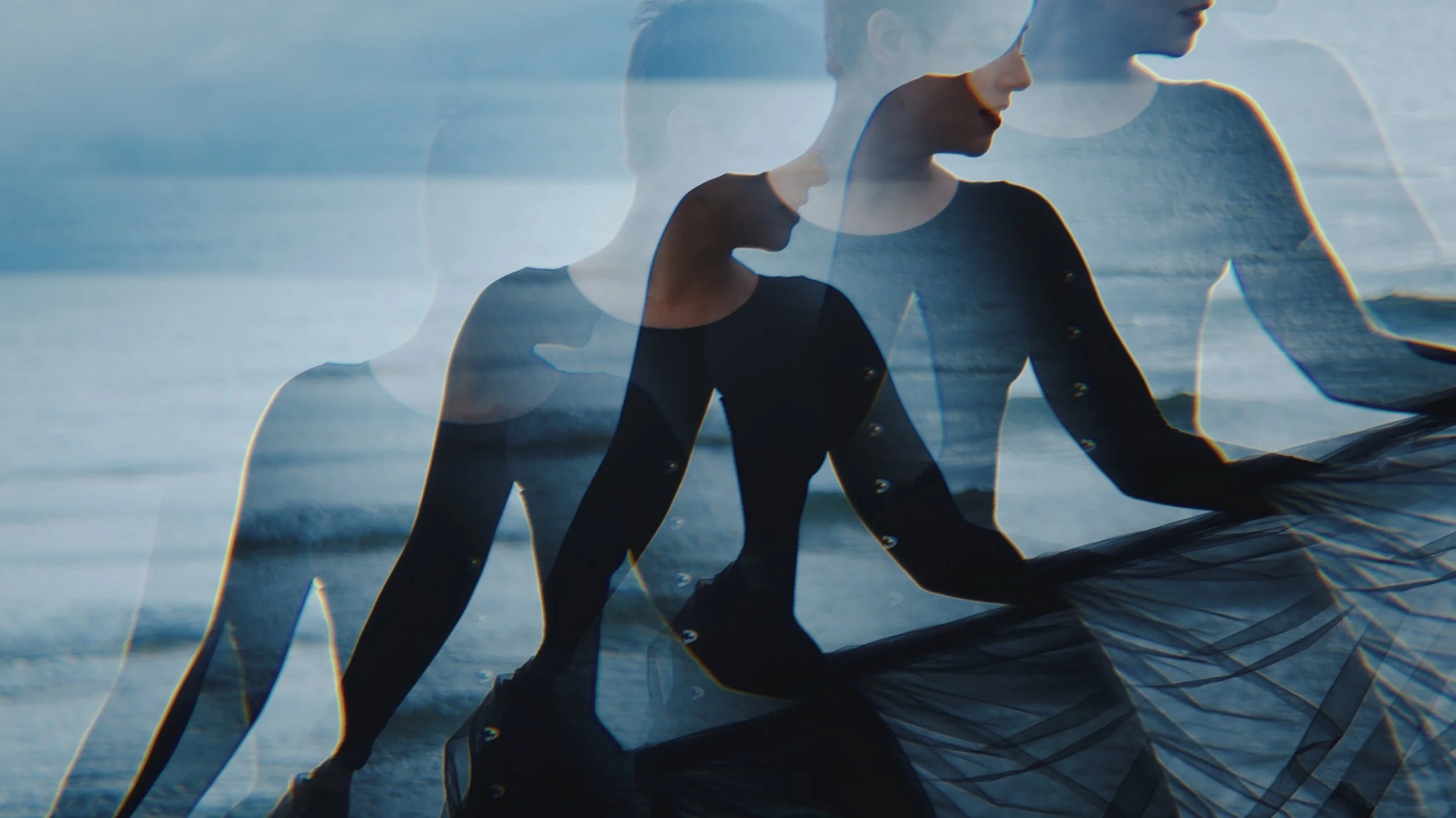 Multiple overlaid silhouettes of a woman in a black dress, walking on the beach with ocean waves in the background, creating a layered, dreamy effect.