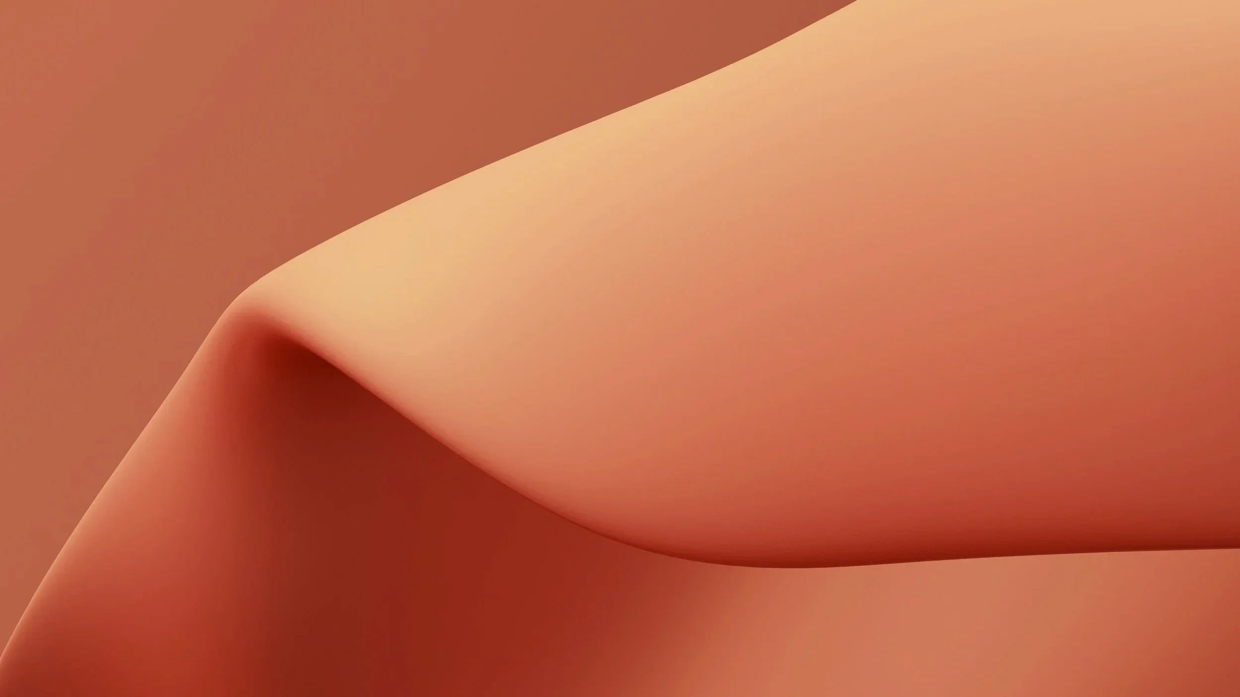 Un'immagine astratta con curve e sfumature di colori caldi, come beige, rosa e marrone.