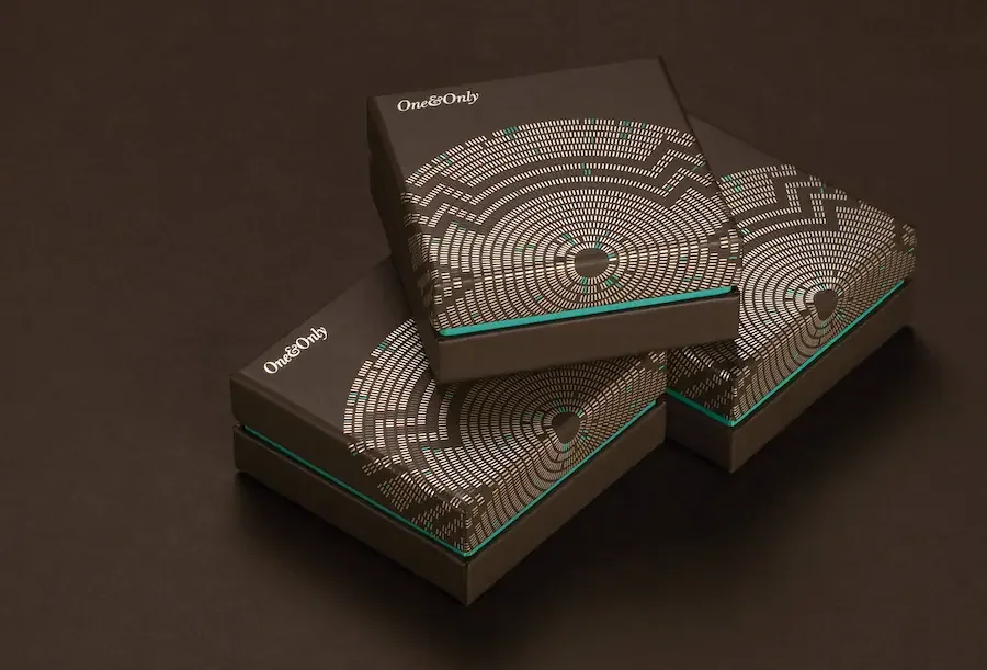 Three black boxes with a circular, digital-style pattern on the top, labeled 'One & Only'.
