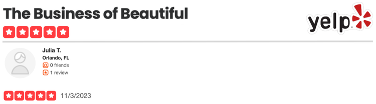 Screenshot of a Yelp review titled "The Business of Beautiful" by Julia T. from Orlando, FL, dated November 3, 2023, with user rating of five stars.