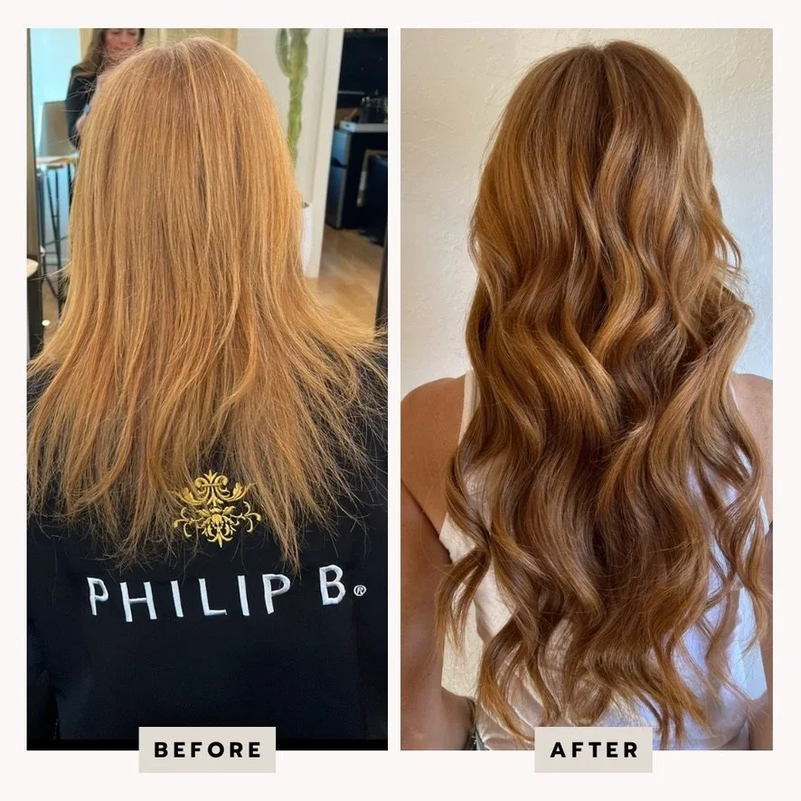 Side-by-side comparison of a woman's hair before and after a hair transformation. In the 'before' image, her hair is straight, frizzy, and lighter in color. In the 'after' image, her hair is styled with soft, voluminous waves and a richer, darker shade of red.