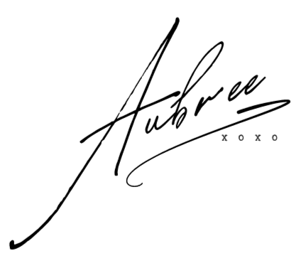 A dark, stylized logo with the text 'XOXO' and what appears to be handwritten or scripted elements.