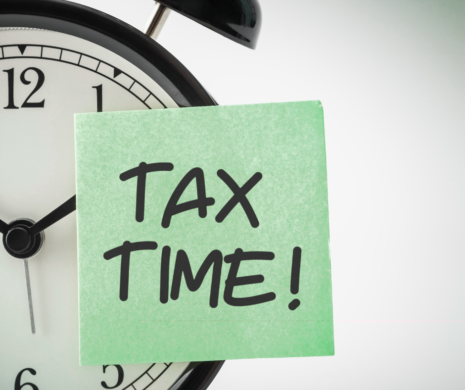 "Tax time" post-it-note over a clock