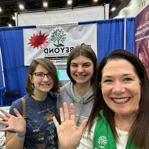 Charla at Homeschool Conferences with two teen girls