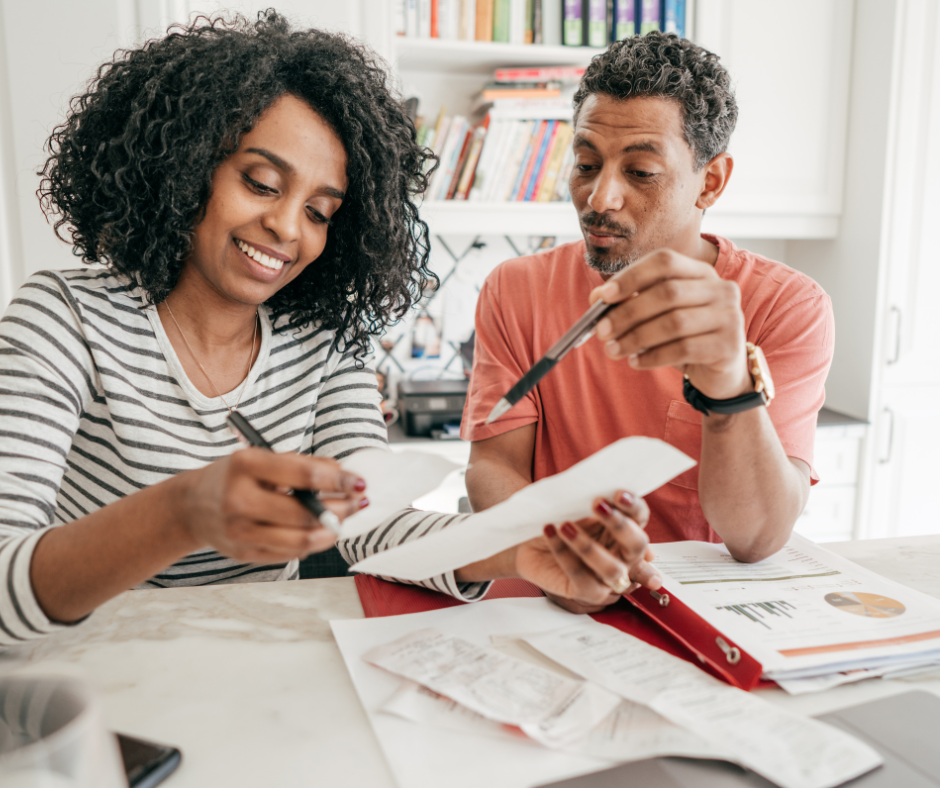 Parents reviewing financial forms