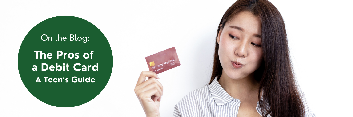 Girl holding a debit card