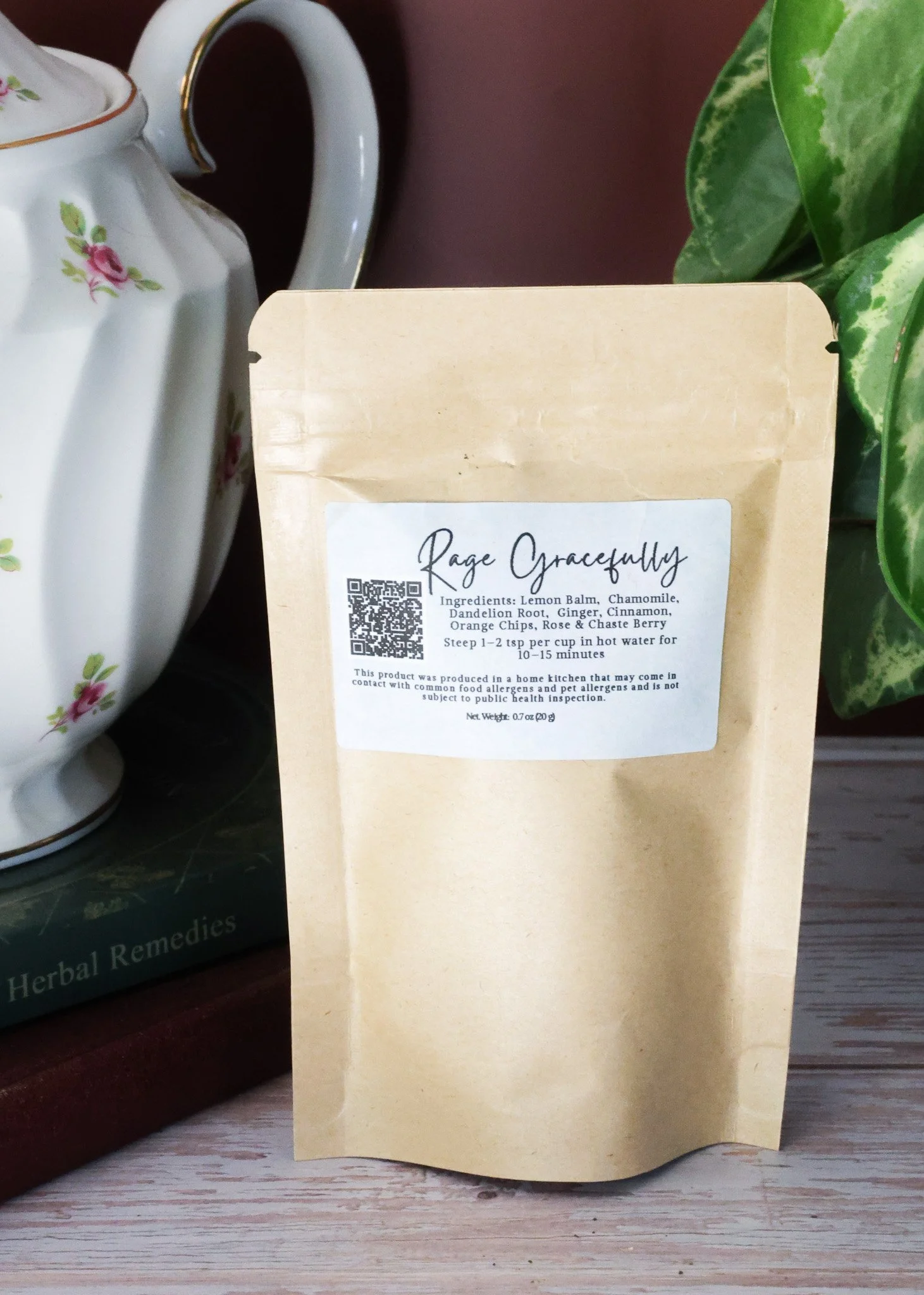 Herbal PMS support tea with chasteberry, lemon balm, dandelion root, ginger root, cinnamon, orange peel, and rose petals.