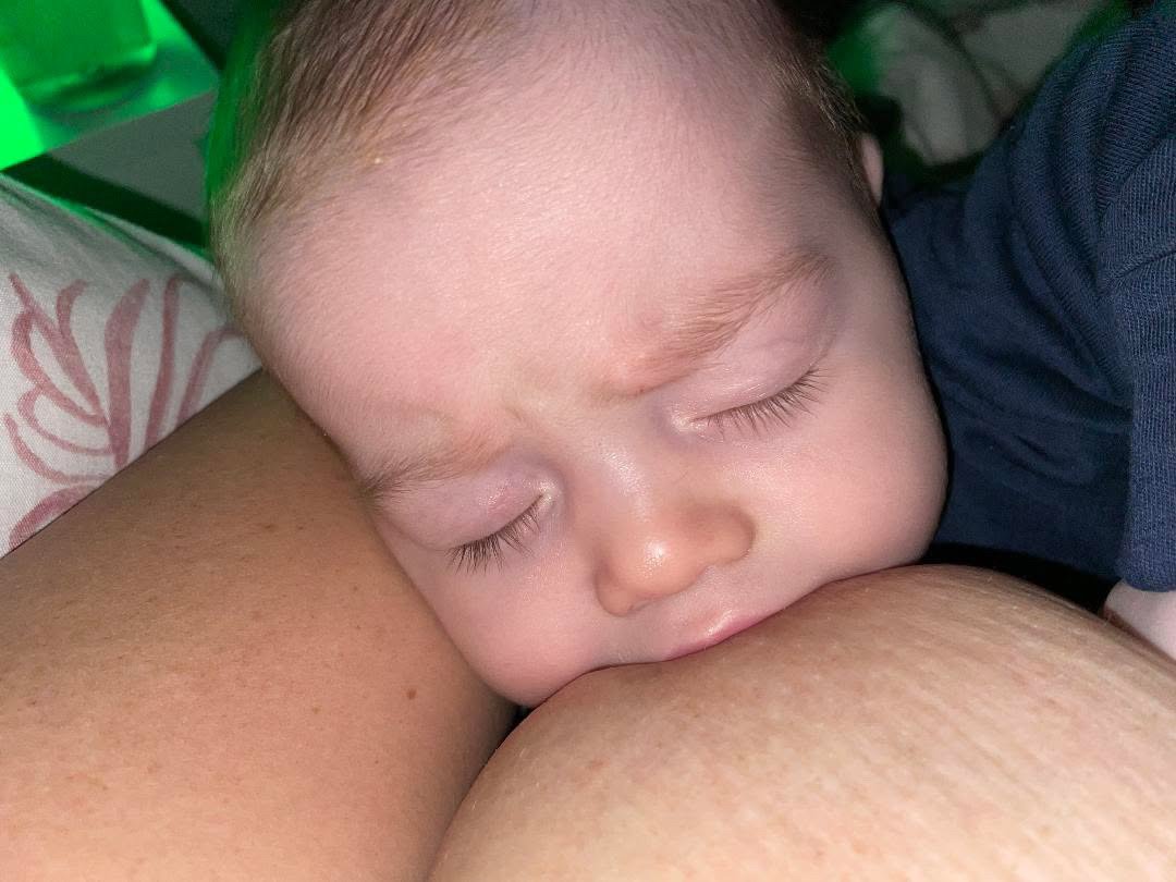 Newborn baby breastfeeding close up - specialist lactation support IBCLC Chelsea Thomas-Hamblin Bath Bradford on Avon
