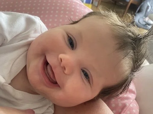 Happy smiling baby - infant feeding support Nurtured With Joy lactation consultancy Bradford on Avon Bath Somerset