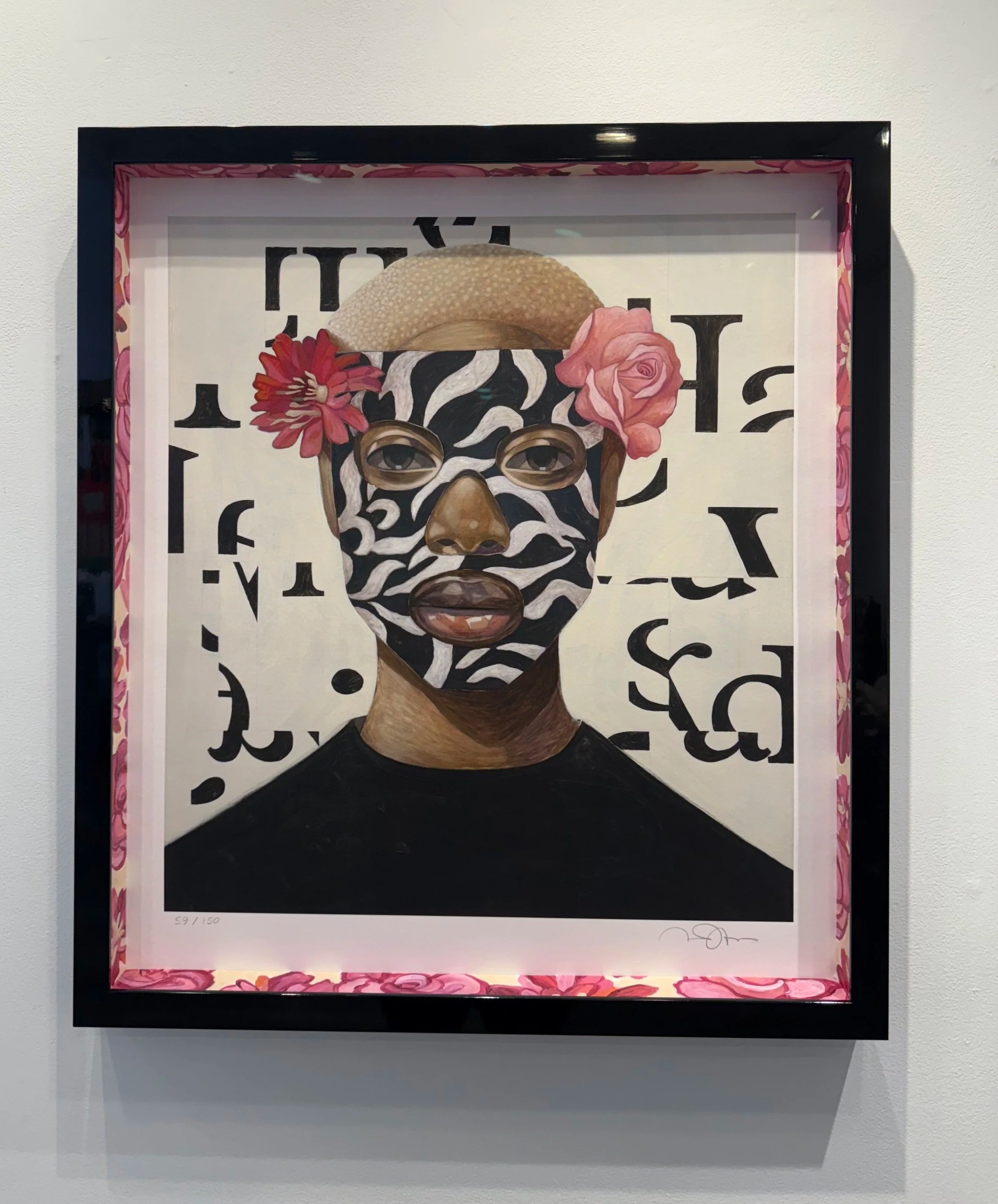 Portrait of a woman with zebra stripe face paint, wearing a straw hat decorated with pink flowers, small glasses, and a black top, with abstract black letters in the background.