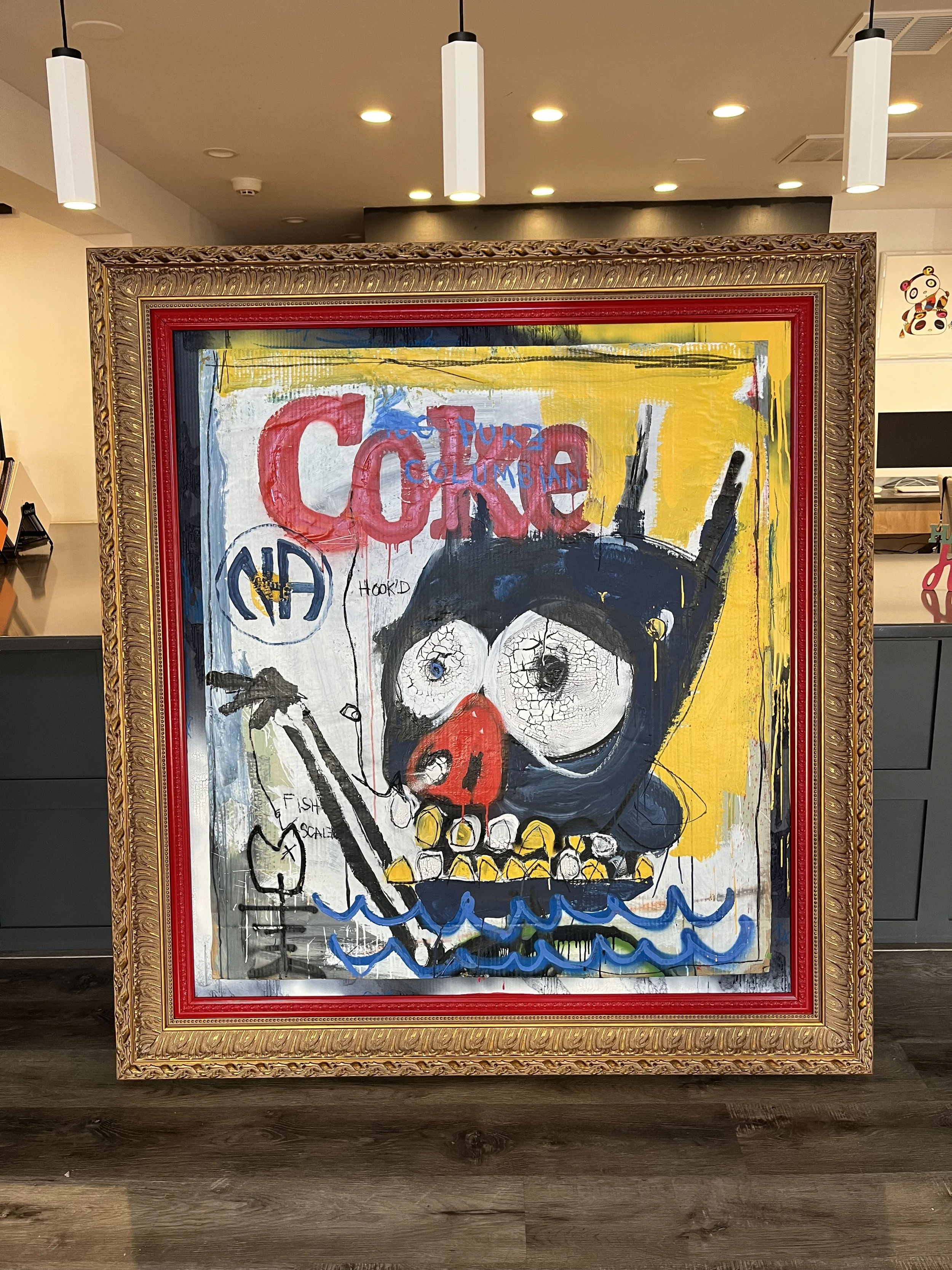 An abstract art painting of a dog wearing a life jacket and diving mask, with the word 'CONEY' in pink, set in an ornate frame with a yellow background.