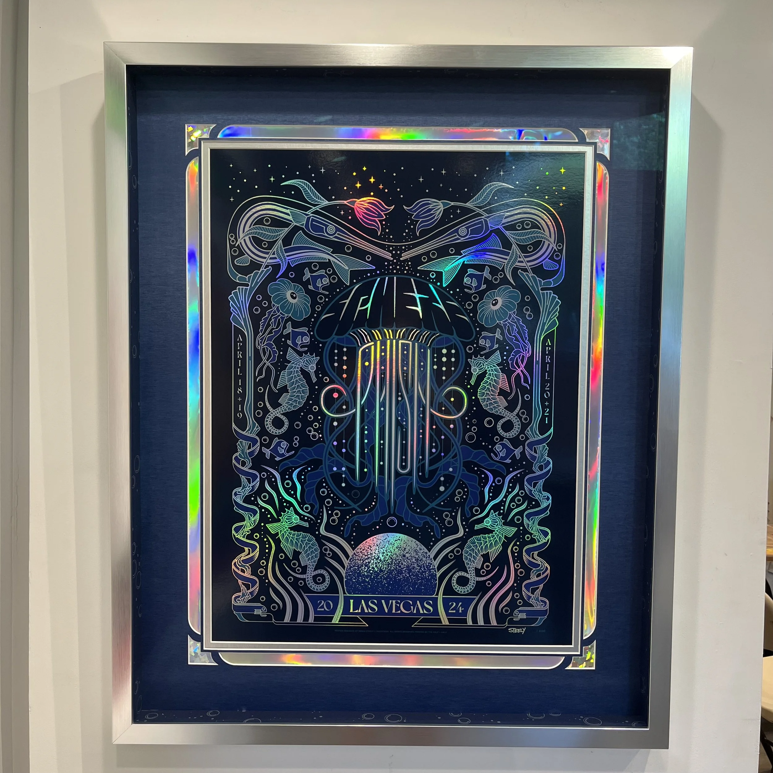 Colorful holographic poster depicting a jellyfish in the center with ocean motifs, marine creatures, and decorative elements, labeled 'Las Vegas 2024'.