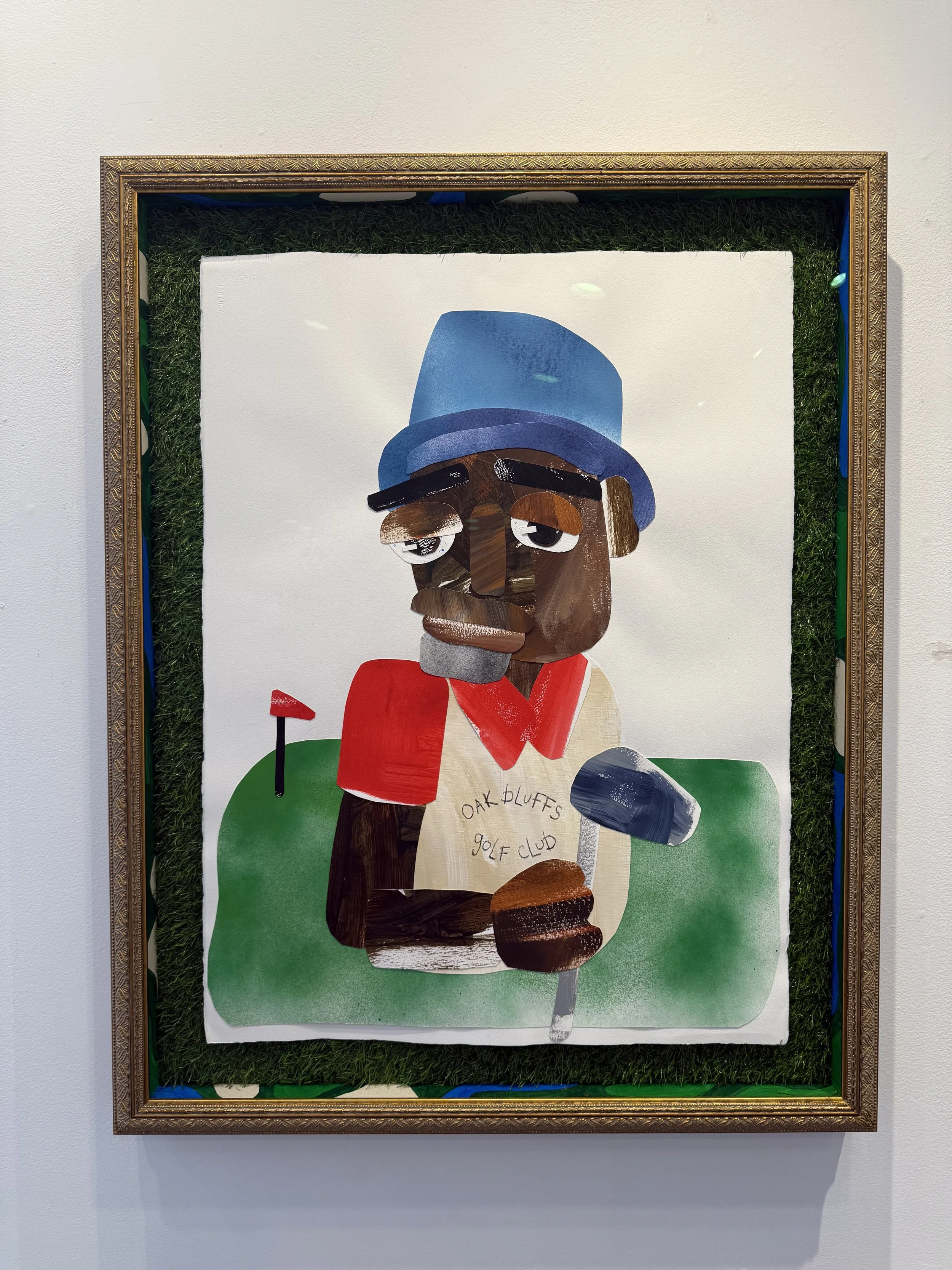 A collage artwork of a cartoonish golfer with a brown face, blue hat, red shirt, holding a golf club, on a green background with a red flag, framed with a gold frame and green textured border.