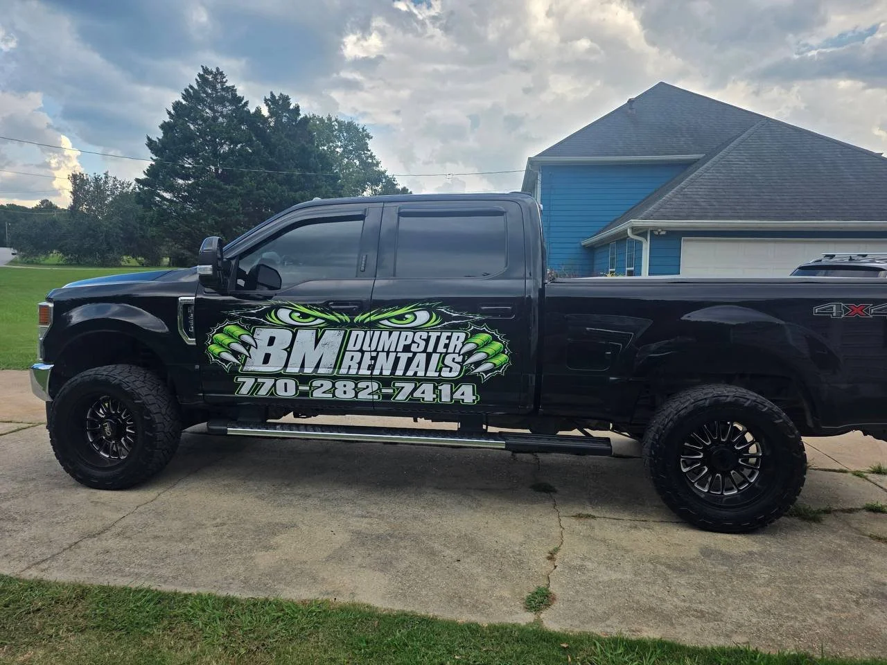BM Dumpsters Branded Truck
