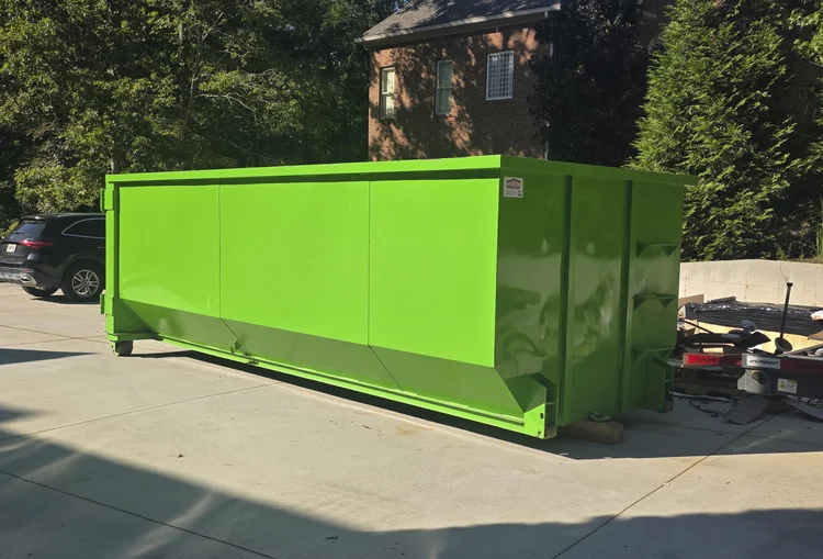 30 yard roll-off dumpster showing its large capacity and six foot wall height