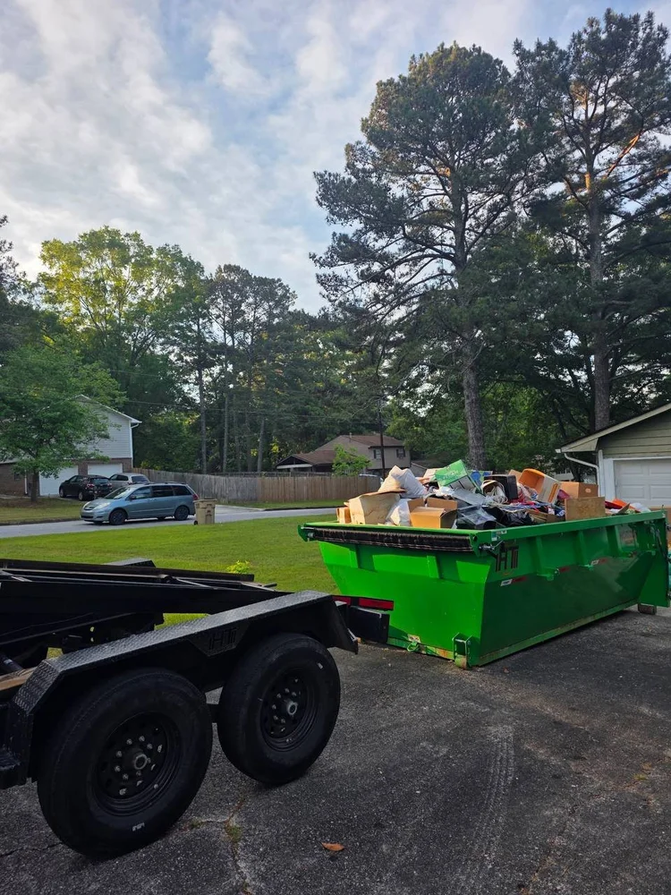 Loaded 14 yard roll-off dumpster on a customer job