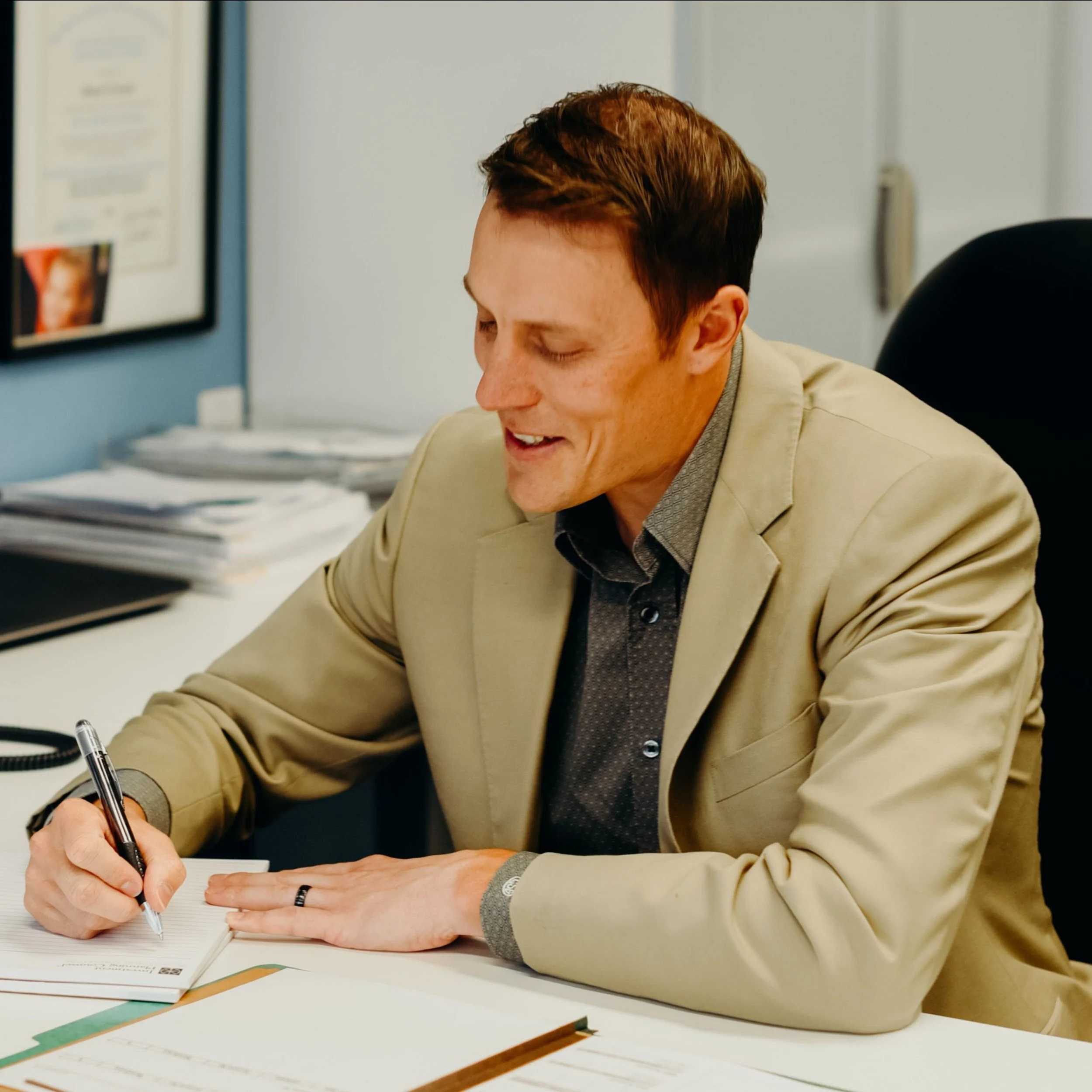 Chris Getzlaf, Portfolio manager looking over his wealth management work in Regina Saskatchewan Canada, CG Wealth Management 