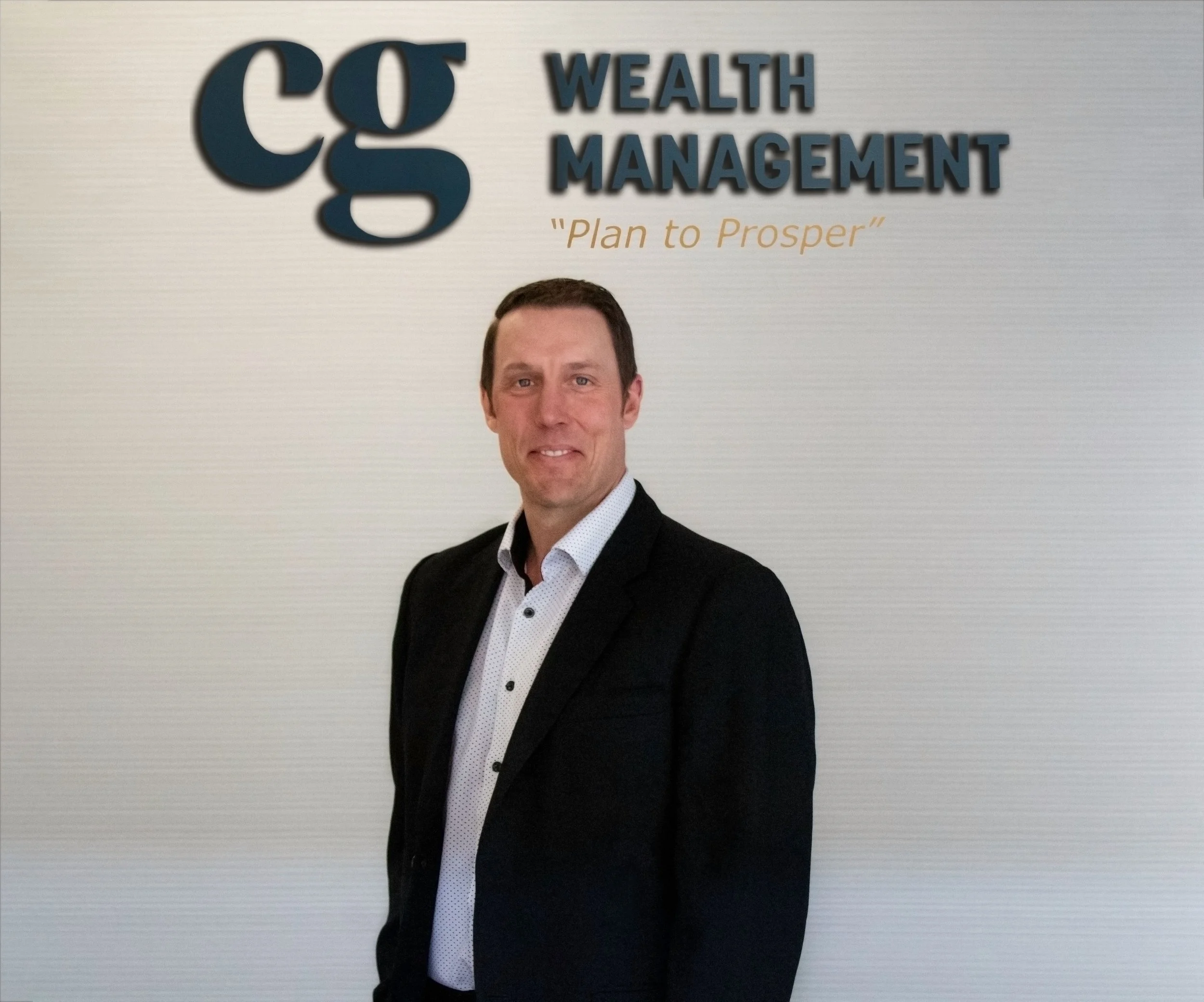 Chris Getzlaf, Portfolio manager looking over his wealth management work in Regina Saskatchewan Canada, CG Wealth Management 