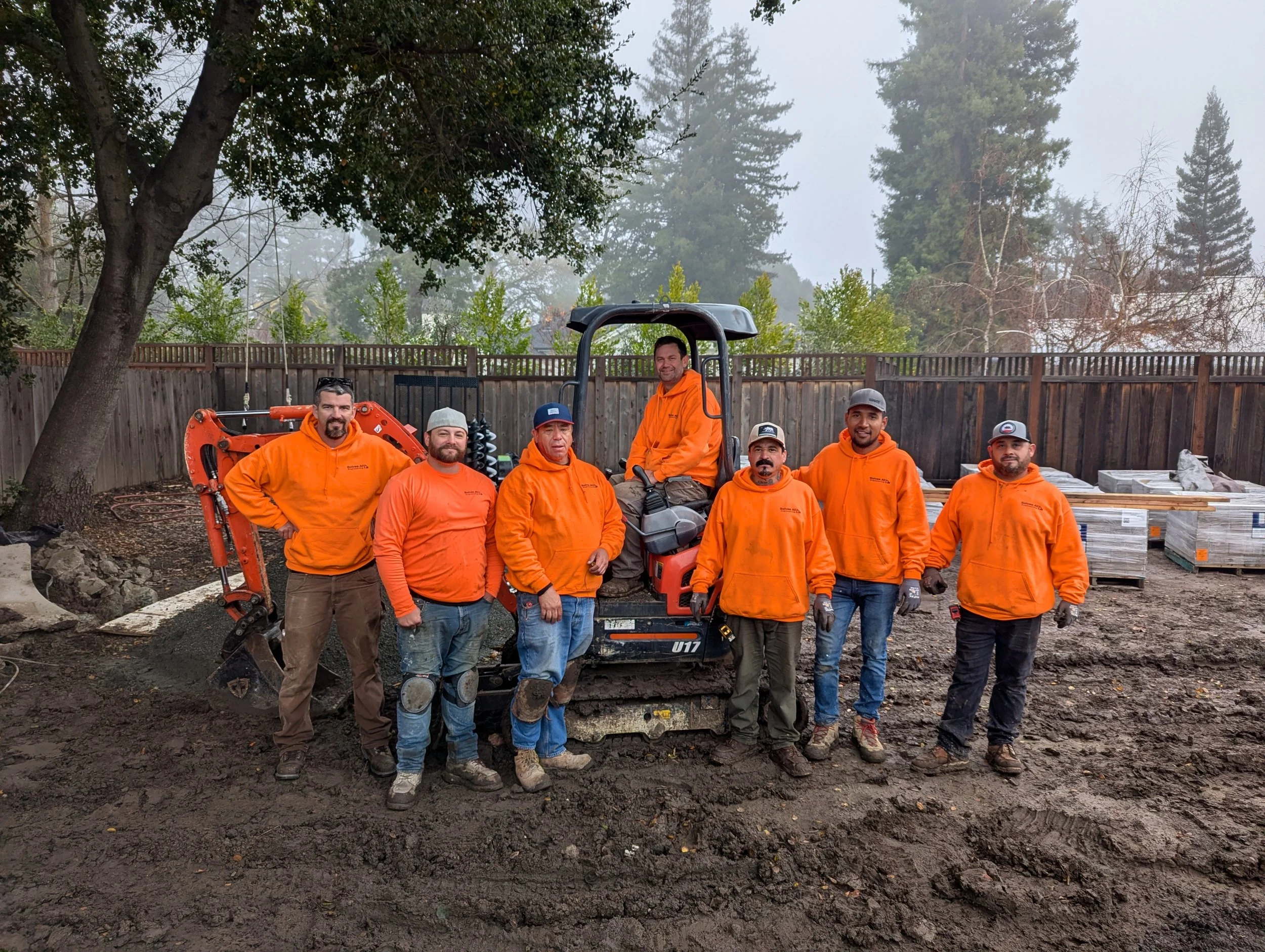 Solves All Engineering crew with excavator on residential job site, East Bay CA