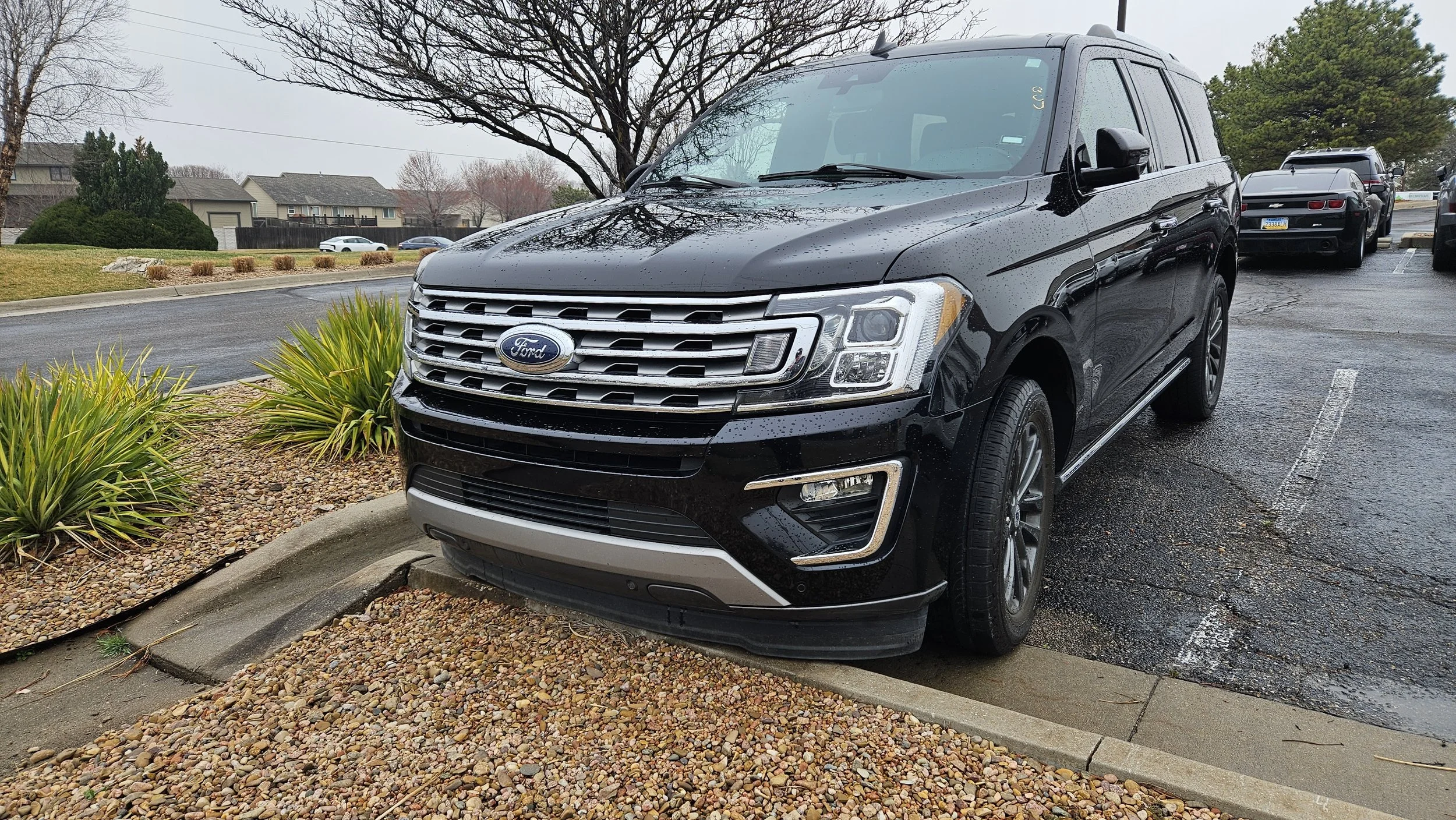 A black 2020 Ford Expedition parked in the Quantum Credit Union parking lot