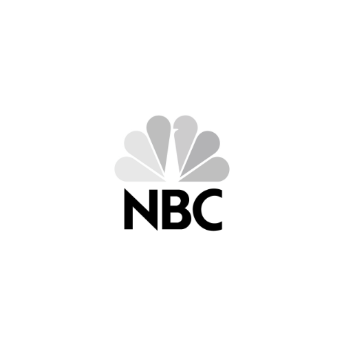 NBC peacock logo with seven colored feathers on a black background.