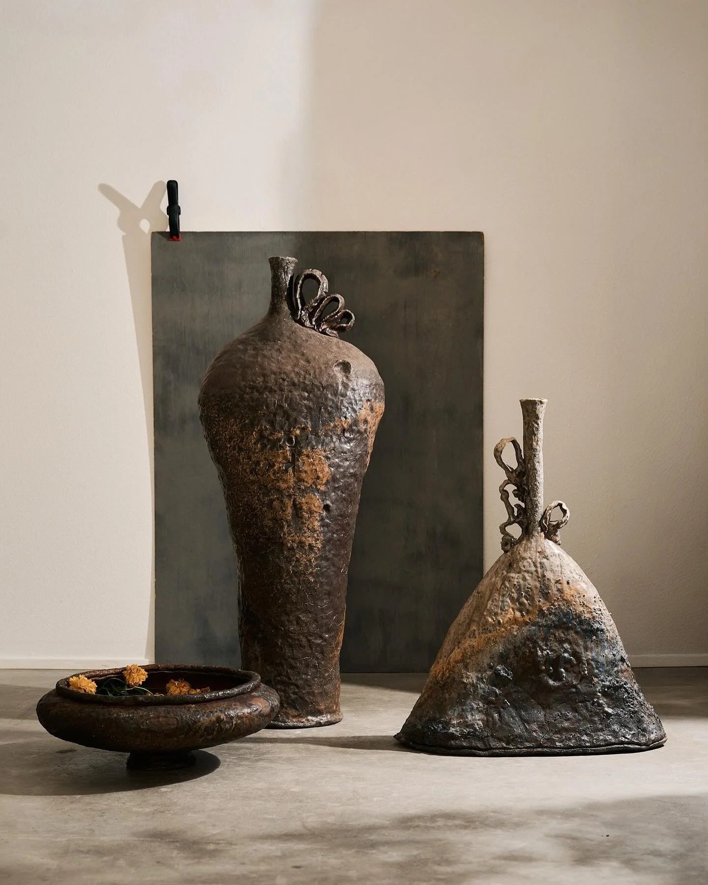 The Three of Us 
Woodfired vessels created during my time in Montana. The landscape creeps into my work subtly and slowly. It often takes leaving a place for me to truly see how the land left its mark on my work. Wide open space, soft rolling hills, 