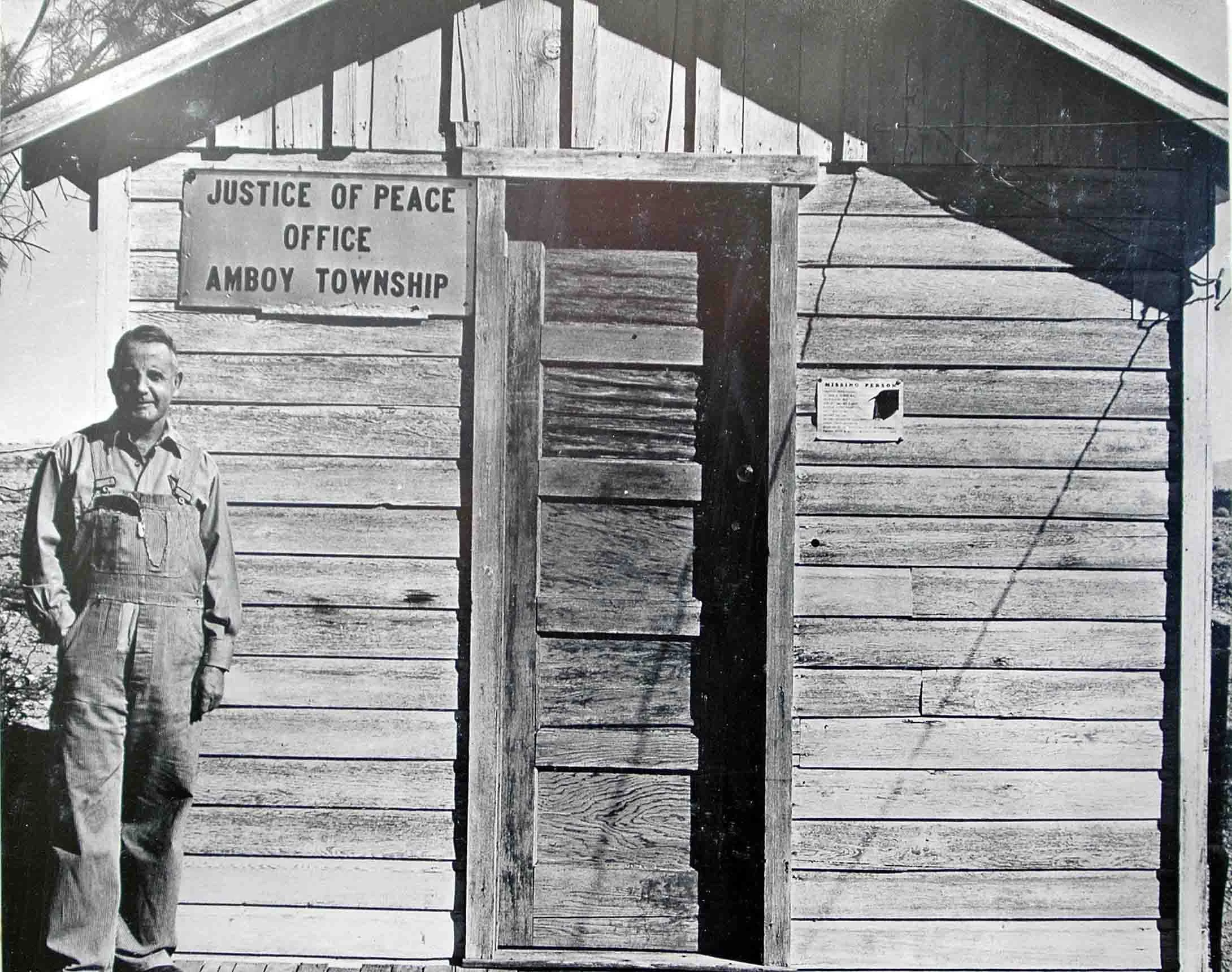Johnny Neilson, Justice of the Peace, at his 8' x 10' mobile courthouse in Danby.