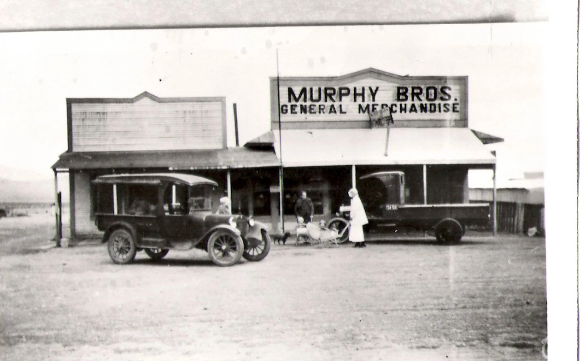 Murphy's original store in Ludlow, California.  The woman standing in front in a white dress is Venus McNeil with her son Jackson in the stroller.