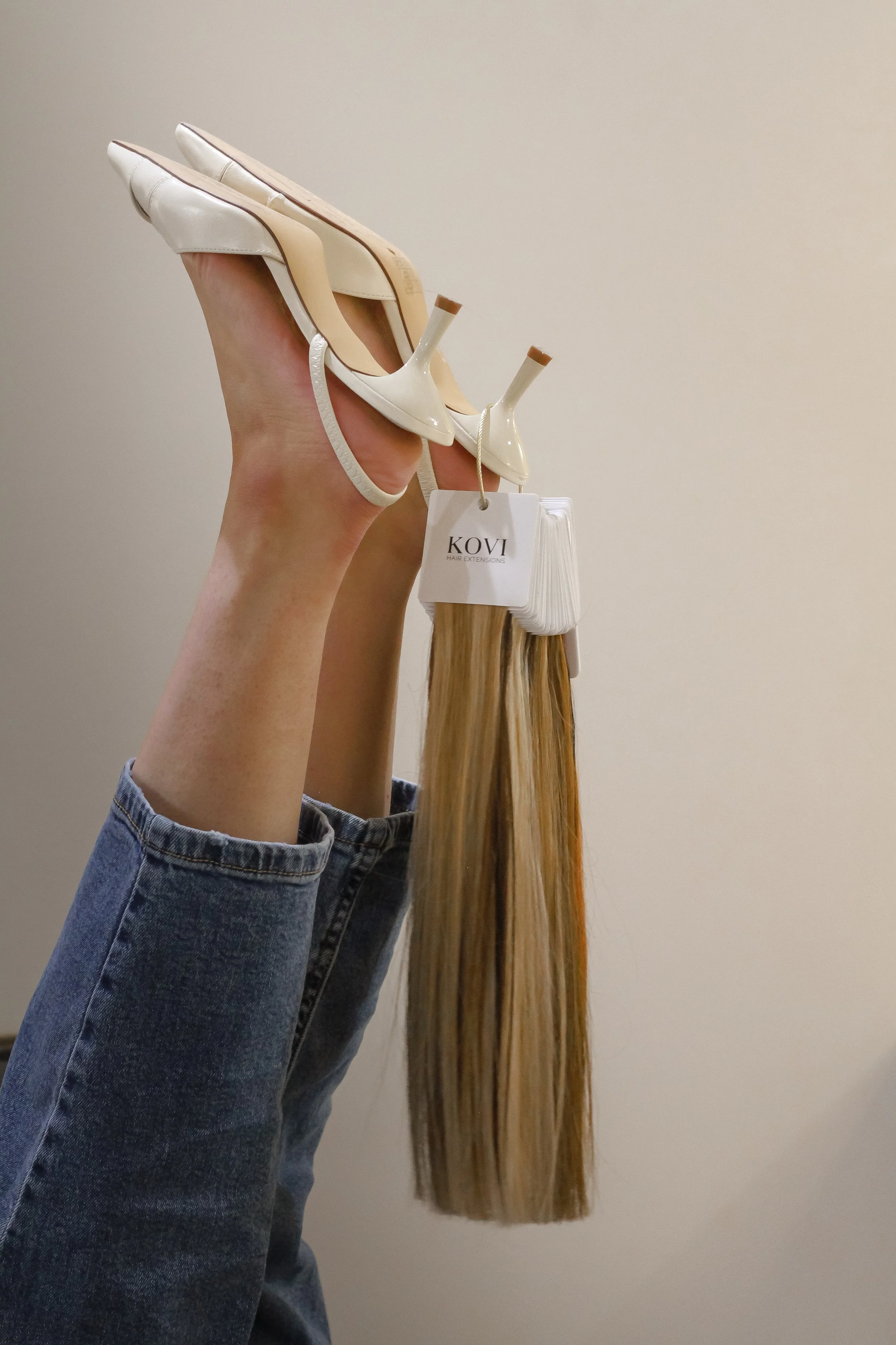 KOVI hair extensions at Berry Hill Beauty’s Same-Day Extension Bar in Nashville, featuring luxury hair color matching and premium extension options.