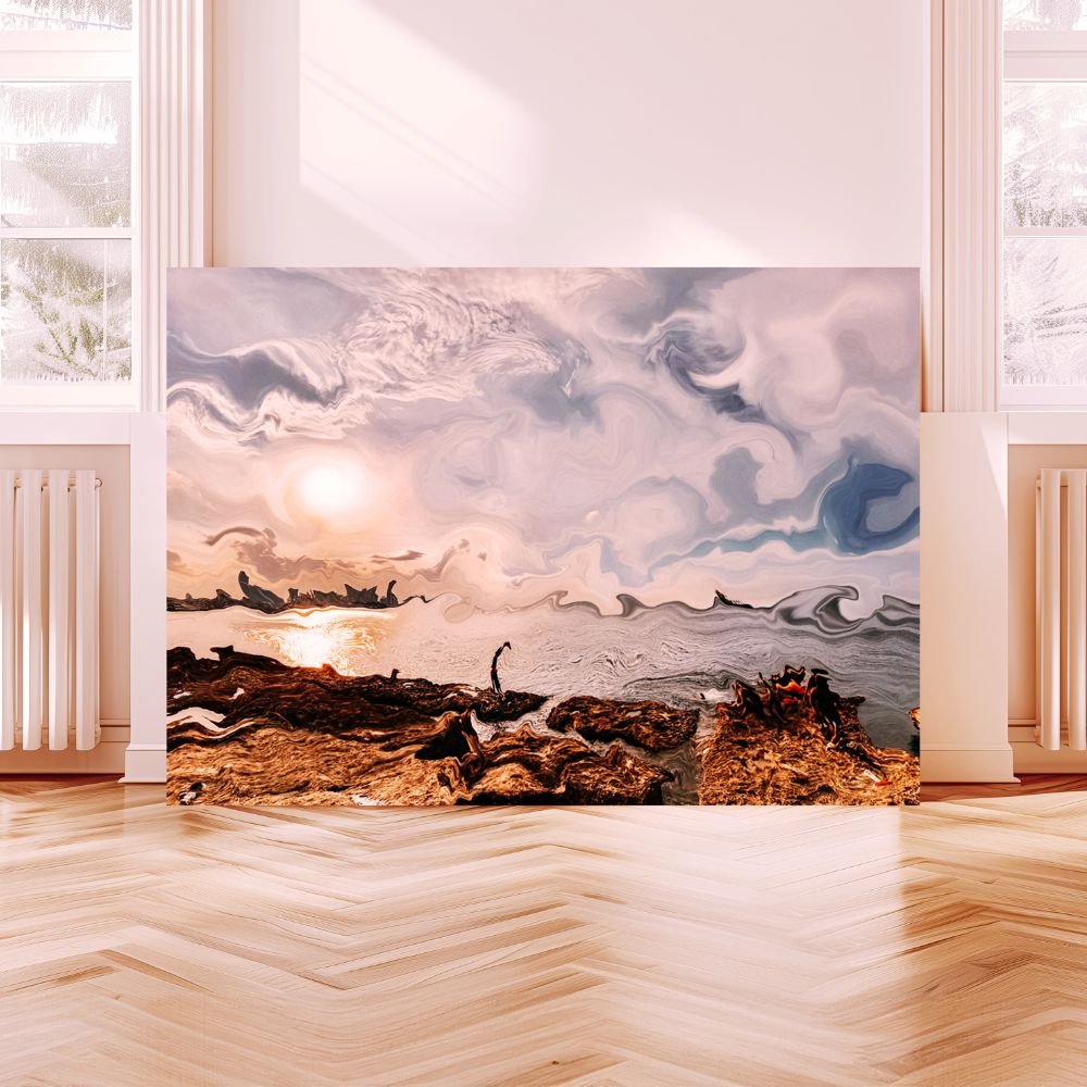 A large abstract landscape painting of a rocky shoreline at sunset with swirling clouds and a setting sun, resting against a white wall in a bright room with wooden floors and tall windows.
