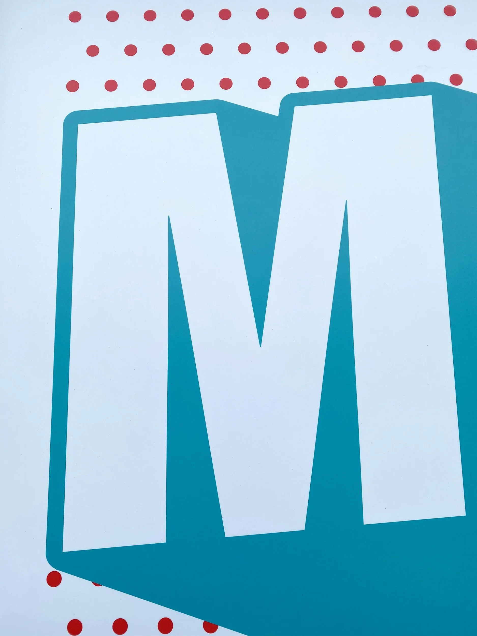 A large white letter M with a blue shadow against a blue background, with red dots arranged in a pattern at the top and bottom.
