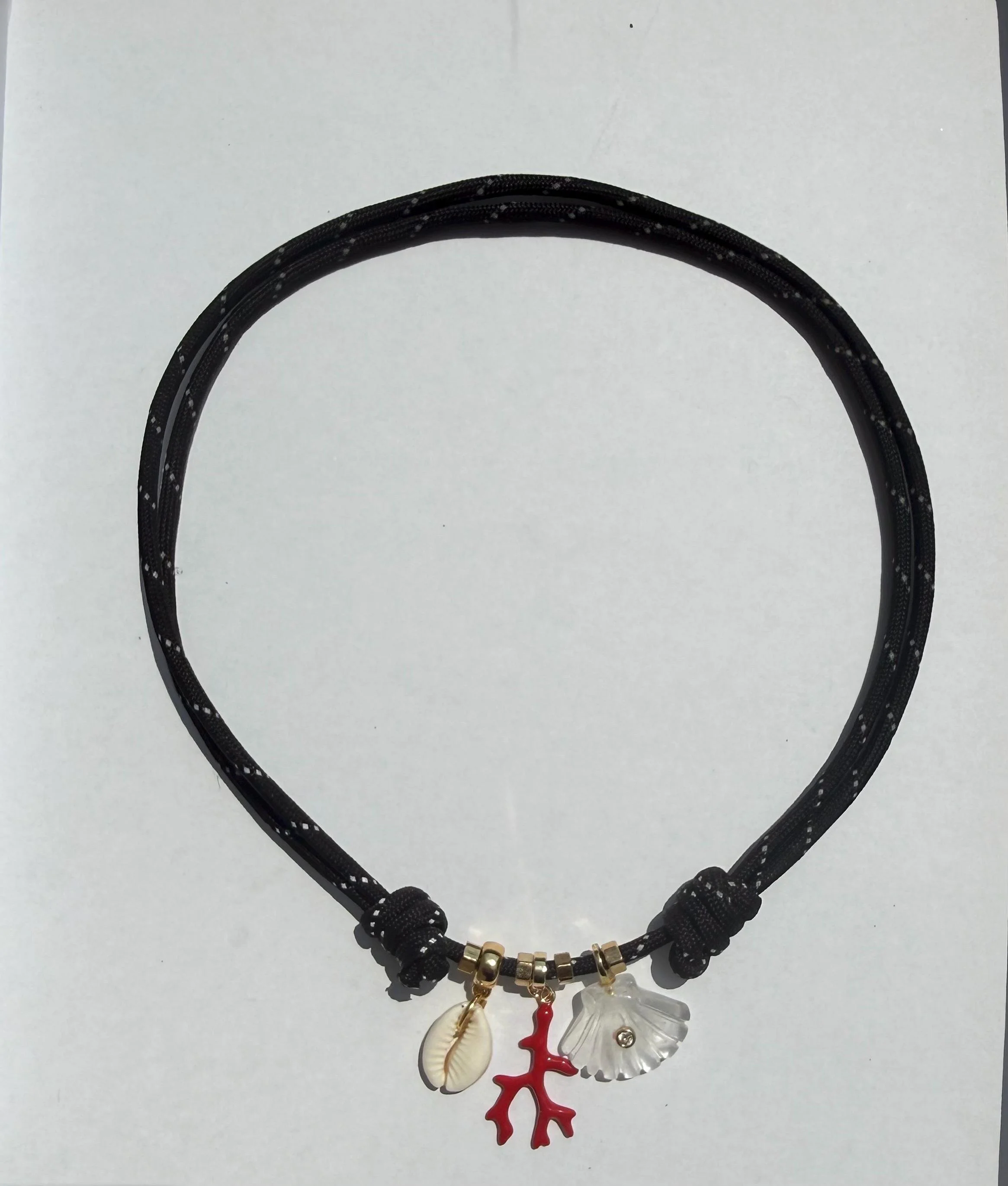 Paracord Necklace: Hand-Carved Quartz Shell, Cowrie, Coral Charms.