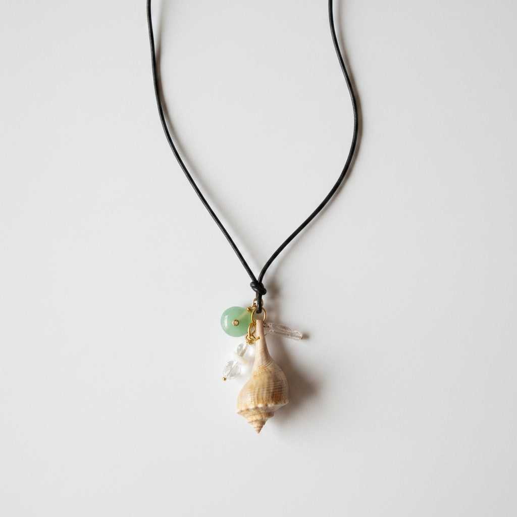 Whelk Shell Charm Necklace on Leather Cord