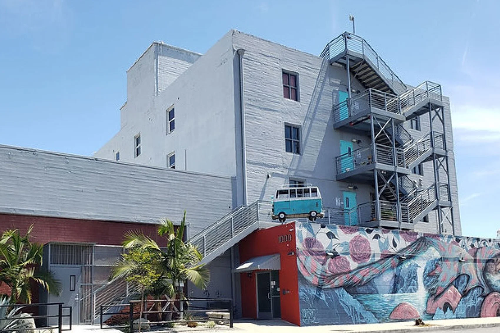 mural painted on wall of a gray building