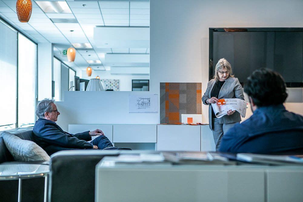 Willetta presenting materials to the team